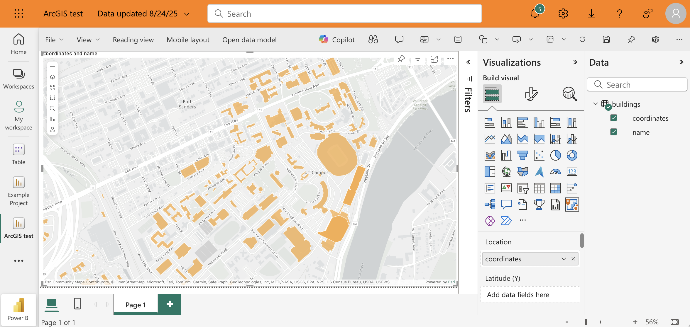 Screenshot of a Power BI report showing an ArcGIS grayscale map overlayed with orange building shapes